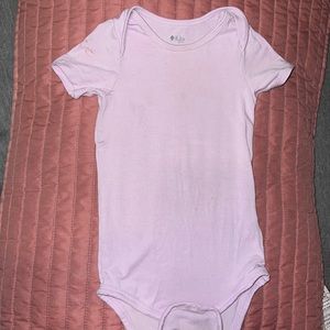 Kyte baby bodysuit In mauve